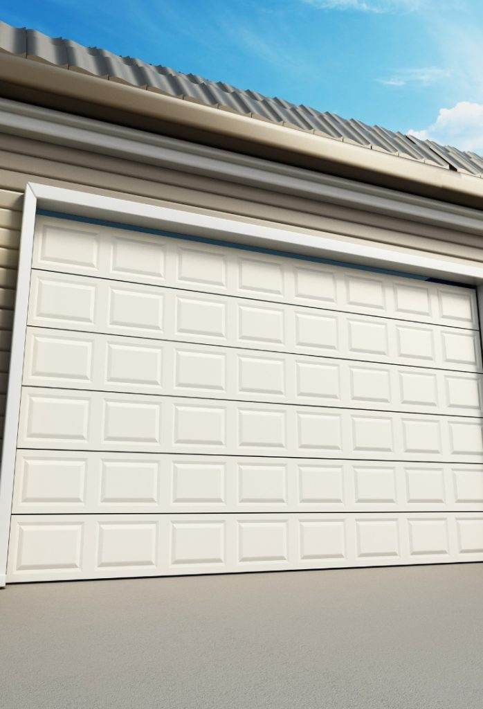 Garage door view against a clear blue sky showcasing modern white design and subtle architectural details Garage door view against a clear blue sky showcasing modern white design and subtle architectural details