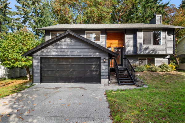Residential garage door in Edmonton enhances home exterior with modern design and functional features suitable for various weather Residential garage door in Edmonton enhances home exterior with modern design and functional features suitable for various weather
