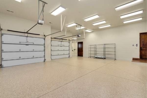 Garage interior with newly installed doors at a home in Edmonton available for same day repair services Garage interior with newly installed doors at a home in Edmonton available for same day repair services