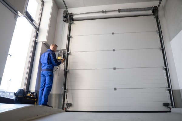 Professional garage door technician installs a new opener in Edmonton on the same day Professional garage door technician installs a new opener in Edmonton on the same day