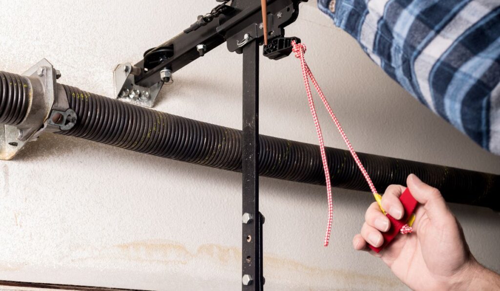 Extension spring repair on residential garage door