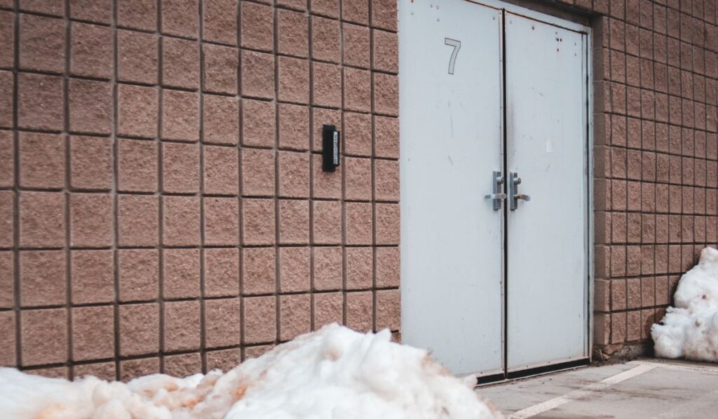 Safe thawing a frozen garage door with hairdryer