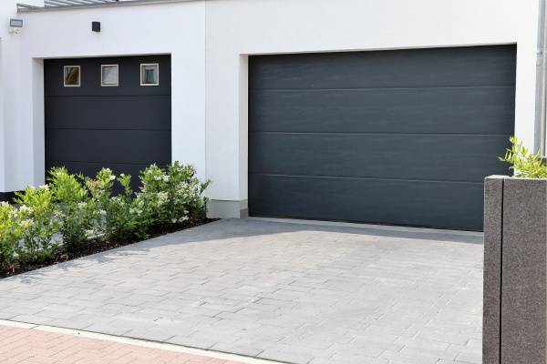 Expert garage door maintenance service enhancing homes with a fresh look near residential area
